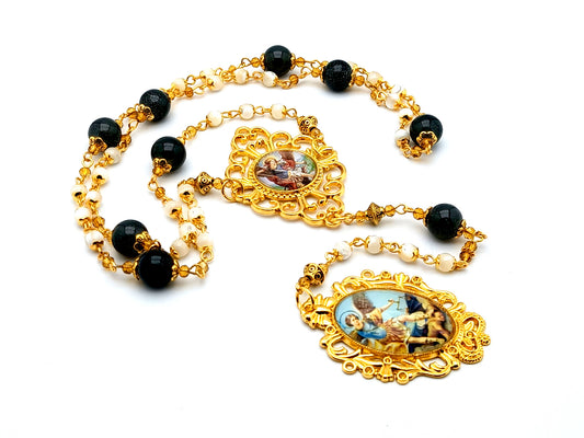 Saint Michael mother of pearl gemstone and gold prayer chaplet with domed Saint Michael picture medal.