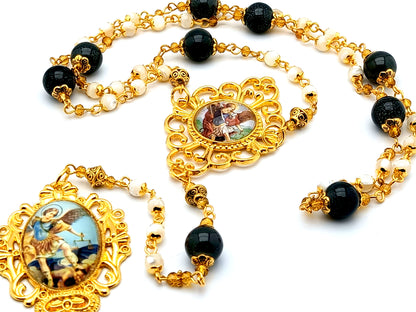 Saint Michael mother of pearl gemstone and gold prayer chaplet with domed Saint Michael picture medal.