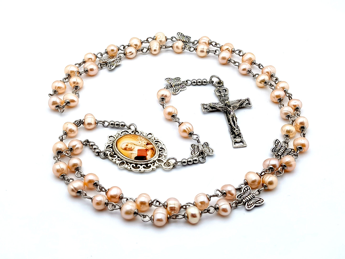 Saint Catherine of Sienna fresh water pearl rosary beads with butterfly Our Father beads and Holy Ghost crucifix.