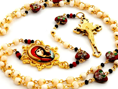 Our Lady of Perpetual Help mother of pearl rosary beads with Saint Benedict gold plated etched crucifix and cloisonné heart beads.