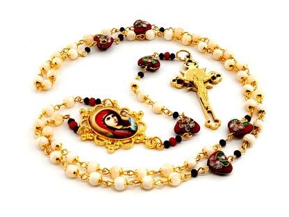 Our Lady of Perpetual Help mother of pearl rosary beads with Saint Benedict gold plated etched crucifix and cloisonné heart beads.