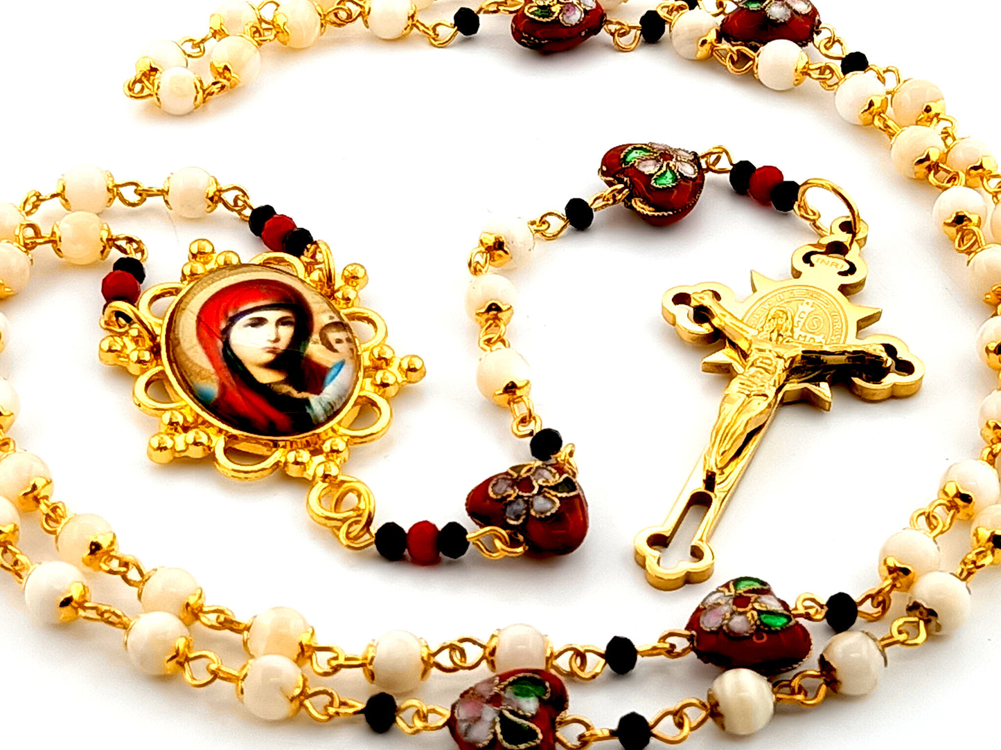 Our Lady of Perpetual Help mother of pearl rosary beads with Saint Benedict gold plated etched crucifix and cloisonné heart beads.