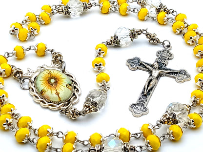 The Blessed Sacrament glass and crystal rosary beads with four Basilica crucifix and Holy Spirit dove center medal.