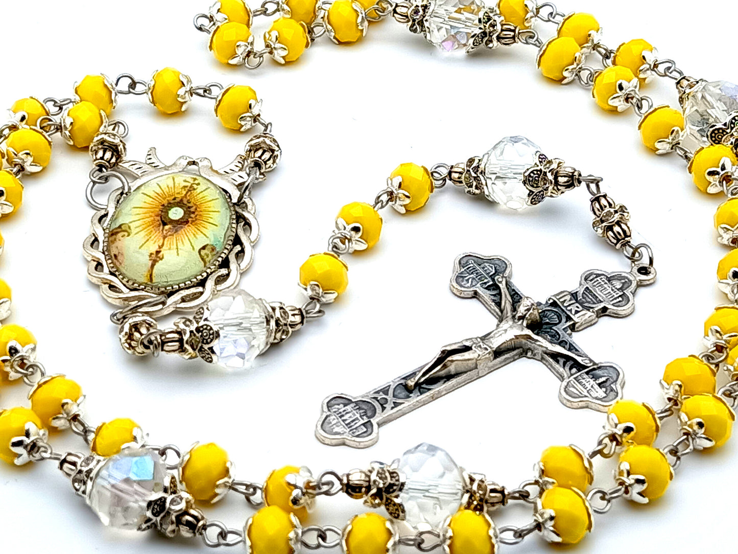 The Blessed Sacrament glass and crystal rosary beads with four Basilica crucifix and Holy Spirit dove center medal.