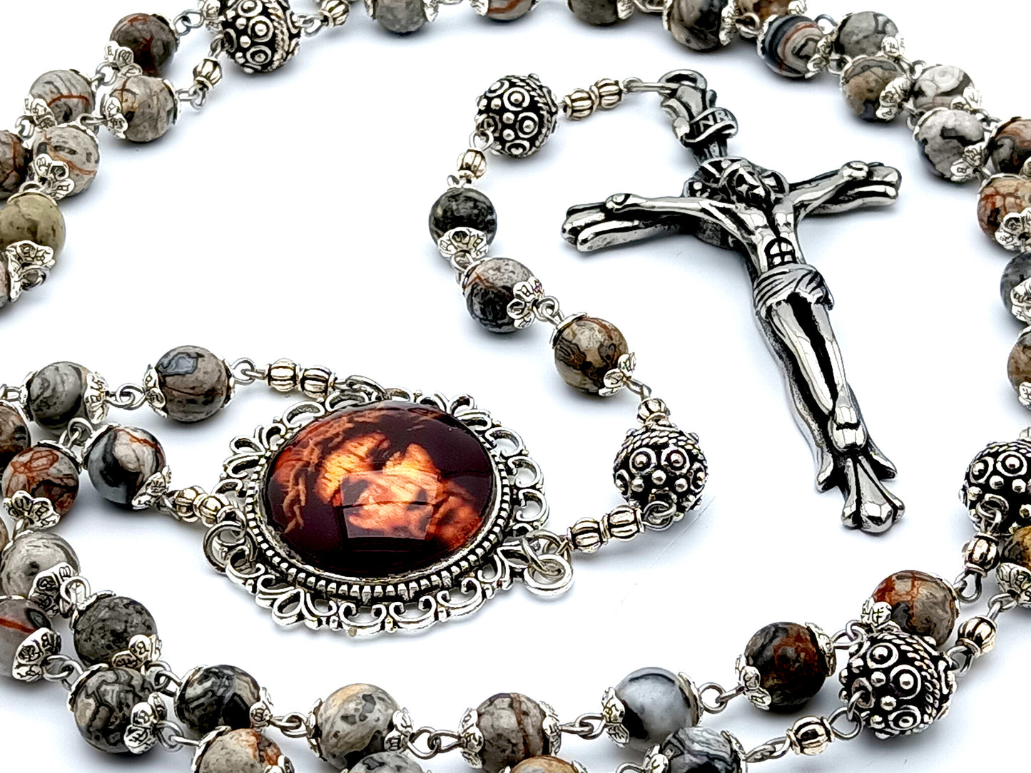 Holy Face of Jesus jasper gemstone rosary beads with large stainless steel crucifix and silver Bali Our Father beads.