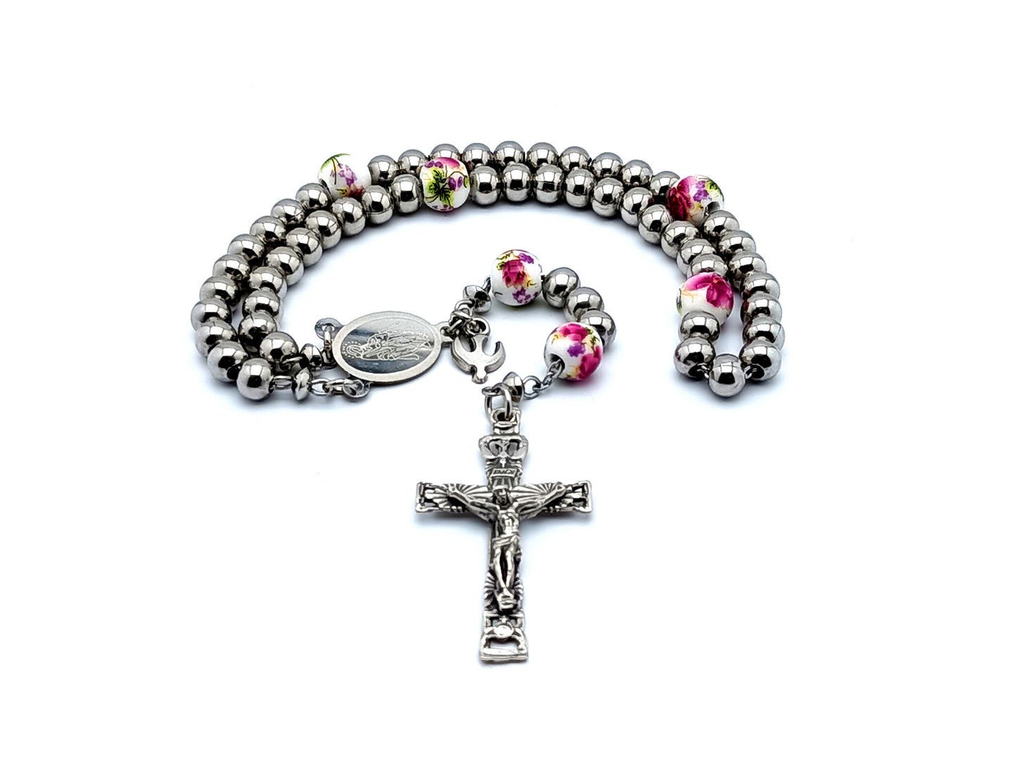 Miraculous medal stainless steel rosary beads with Holy Spirit crucifix and floral porcelain Our Father beads with Holy Spirit medal.