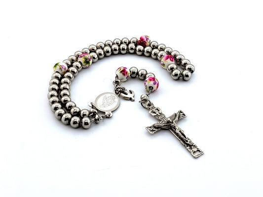 Miraculous medal stainless steel rosary beads with Holy Spirit crucifix and floral porcelain Our Father beads with Holy Spirit medal.