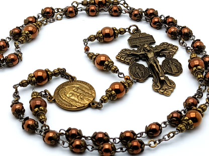 Holy Face prayer chaplet with copper hematite gemstone beads and Pardon crucifix.