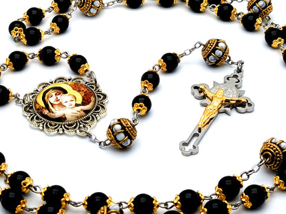 Our Lady of Laus unique rosary beads onyx gemstone rosary beads with enamel Our Father beads and Saint Benedict stainless steel crucifix.