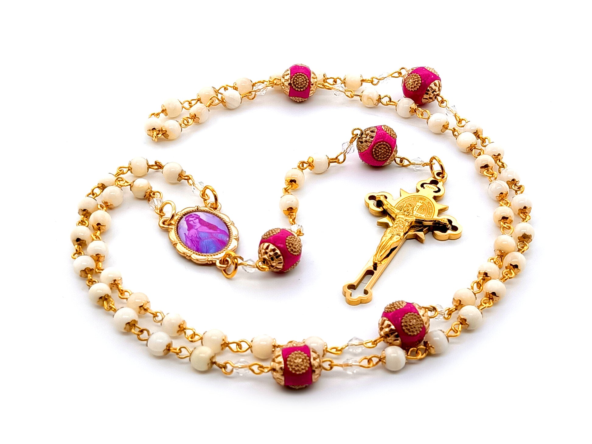 Saint Philomena unique rosary beads  mother of pearl rosary beads with Saint Benedict gold plated stainless steel crucifix and pink enamel Our Father beads.