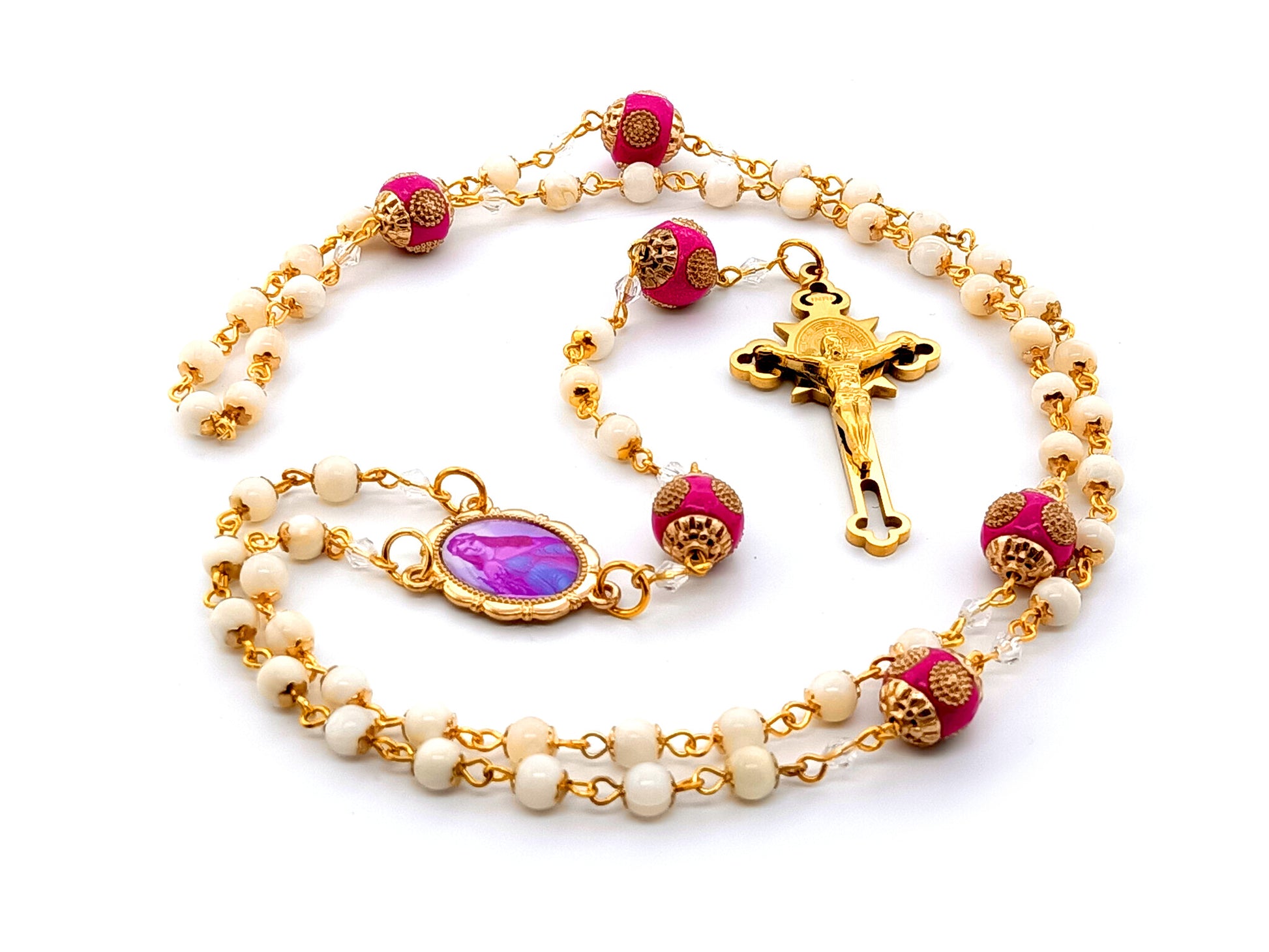 Saint Philomena unique rosary beads  mother of pearl rosary beads with Saint Benedict gold plated stainless steel crucifix and pink enamel Our Father beads.