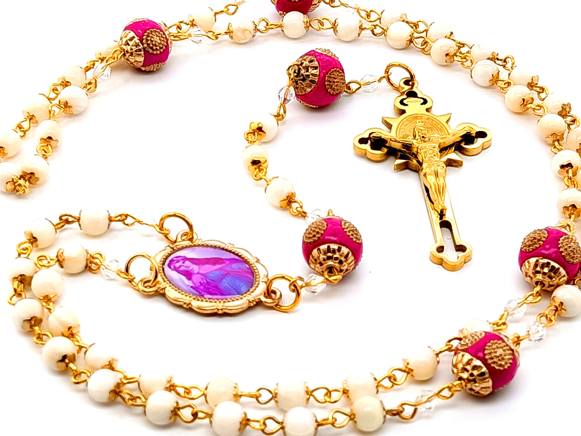 Saint Philomena unique rosary beads  mother of pearl rosary beads with Saint Benedict gold plated stainless steel crucifix and pink enamel Our Father beads.