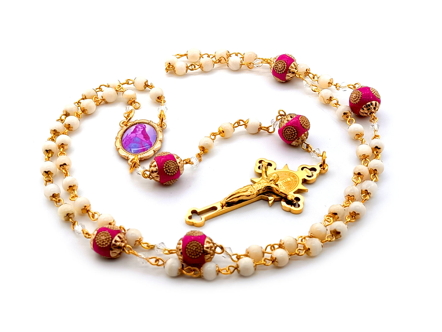 Saint Philomena unique rosary beads  mother of pearl rosary beads with Saint Benedict gold plated stainless steel crucifix and pink enamel Our Father beads.