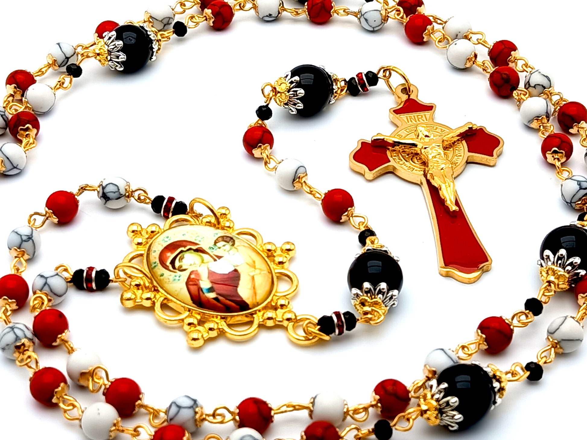 Our Lady of Perpetual Help unique rosary beads gemstone rosary beads with red enamel Saint Benedict crucifix and onyx gemstone Our Father beads.