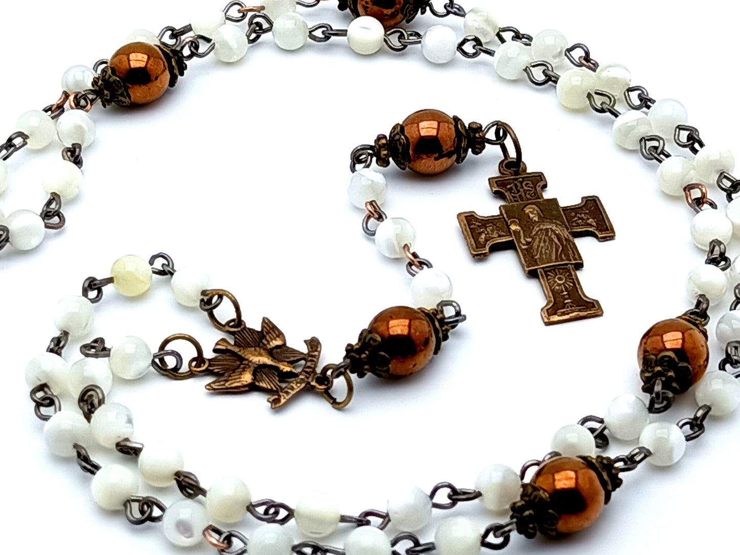 Holy Spirit unique rosary beads antique style mother of pearl and Hematite gemstone rosary beads with the Blessed Sacrament and Our Lady of Lourdes brass cross.