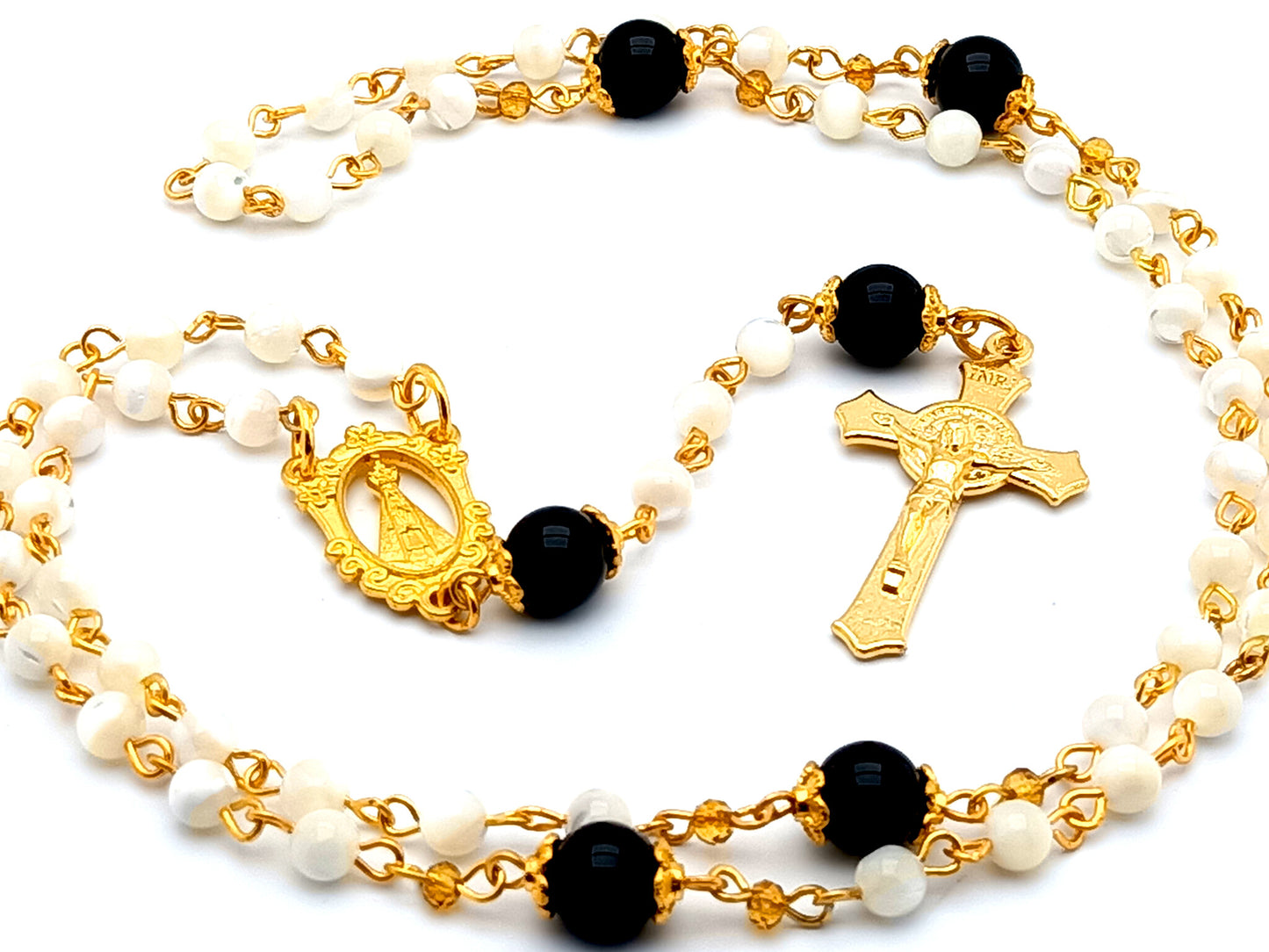 Our Lady of Charity unique rosary beads mother of pearl rosary beads with onyx gemstone Our Father beads and gold plated Saint Benedict crucifix.