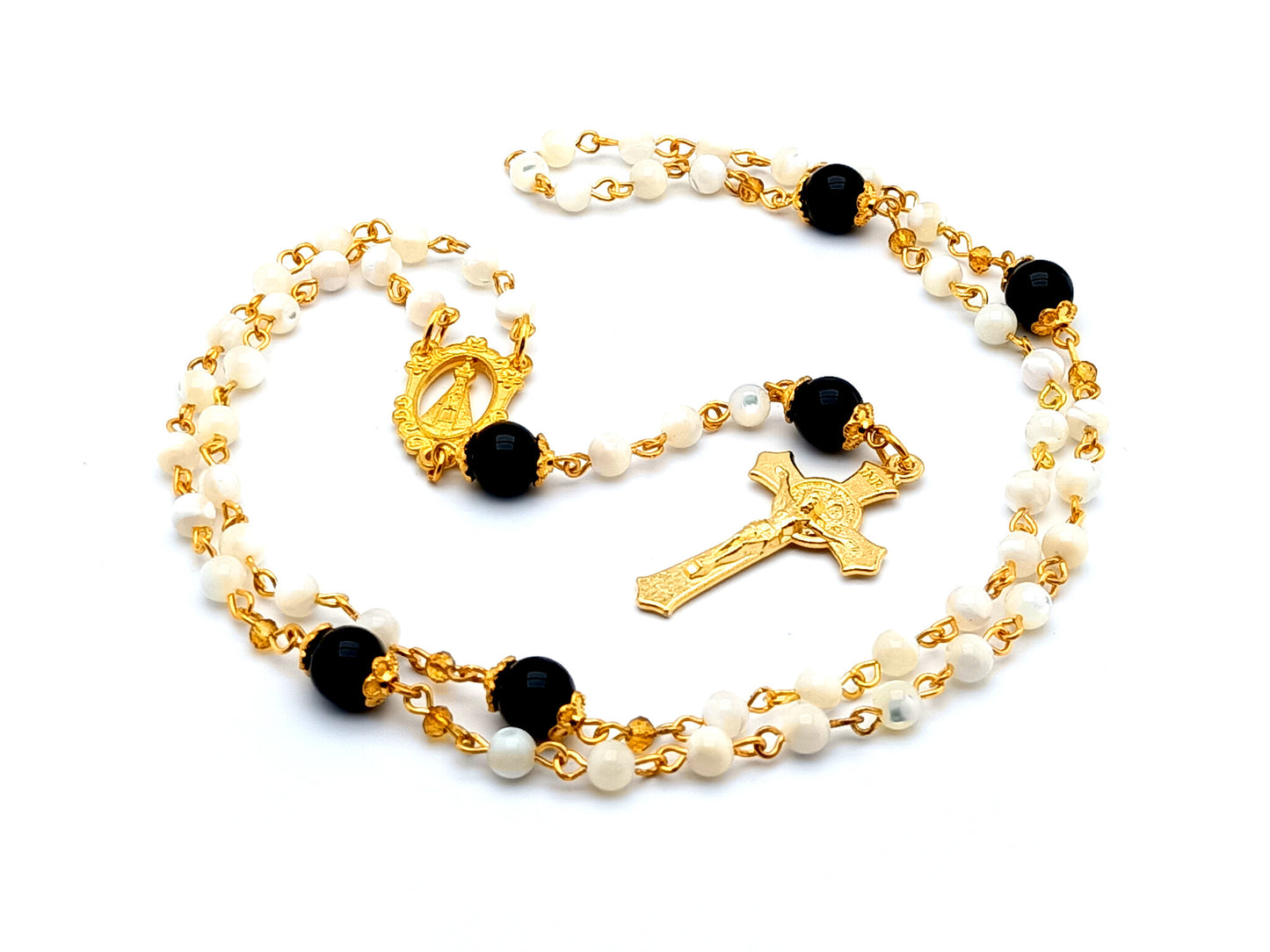 Our Lady of Charity unique rosary beads mother of pearl rosary beads with onyx gemstone Our Father beads and gold plated Saint Benedict crucifix.