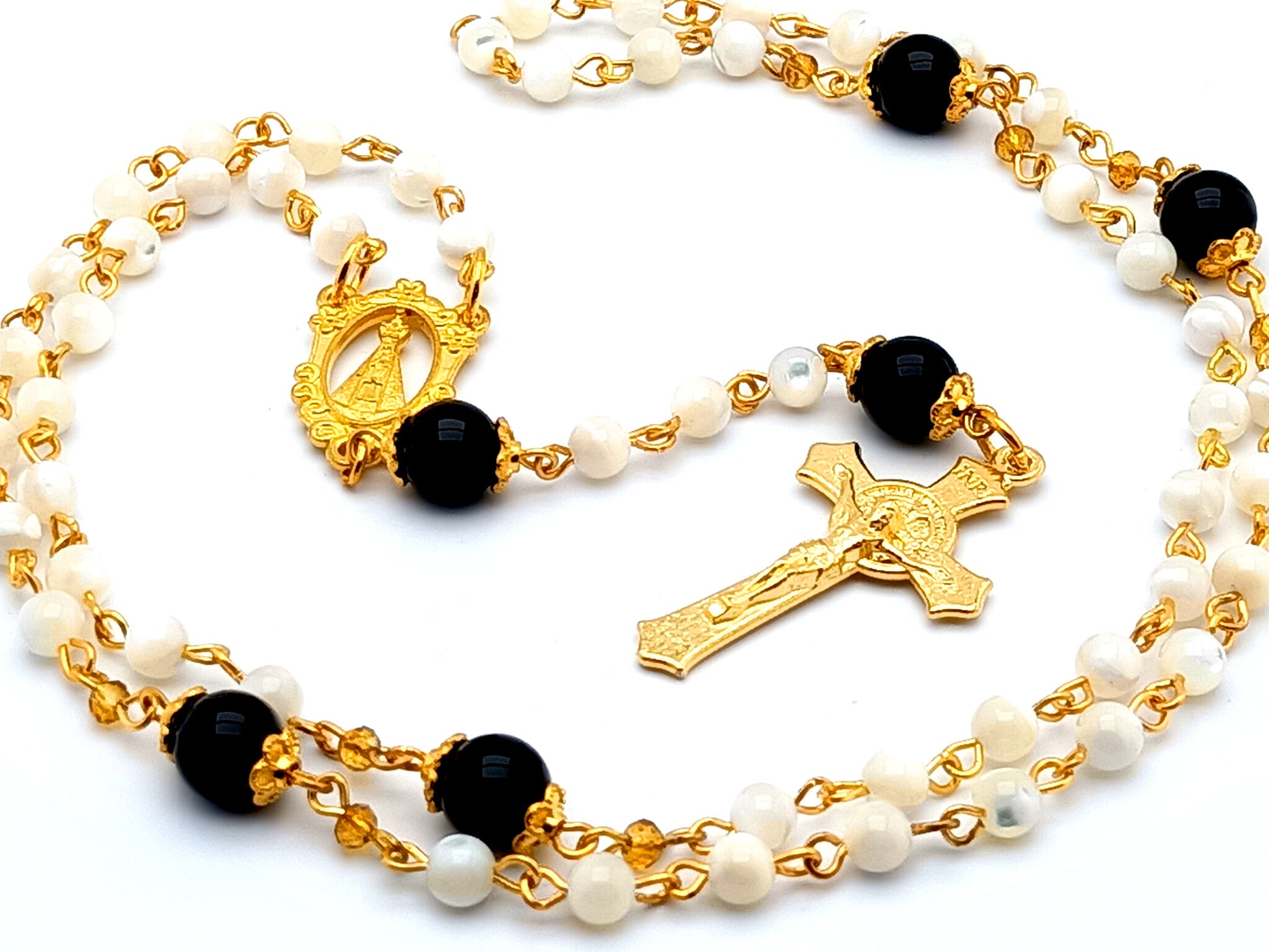 Our Lady of Charity unique rosary beads mother of pearl rosary beads with onyx gemstone Our Father beads and gold plated Saint Benedict crucifix.