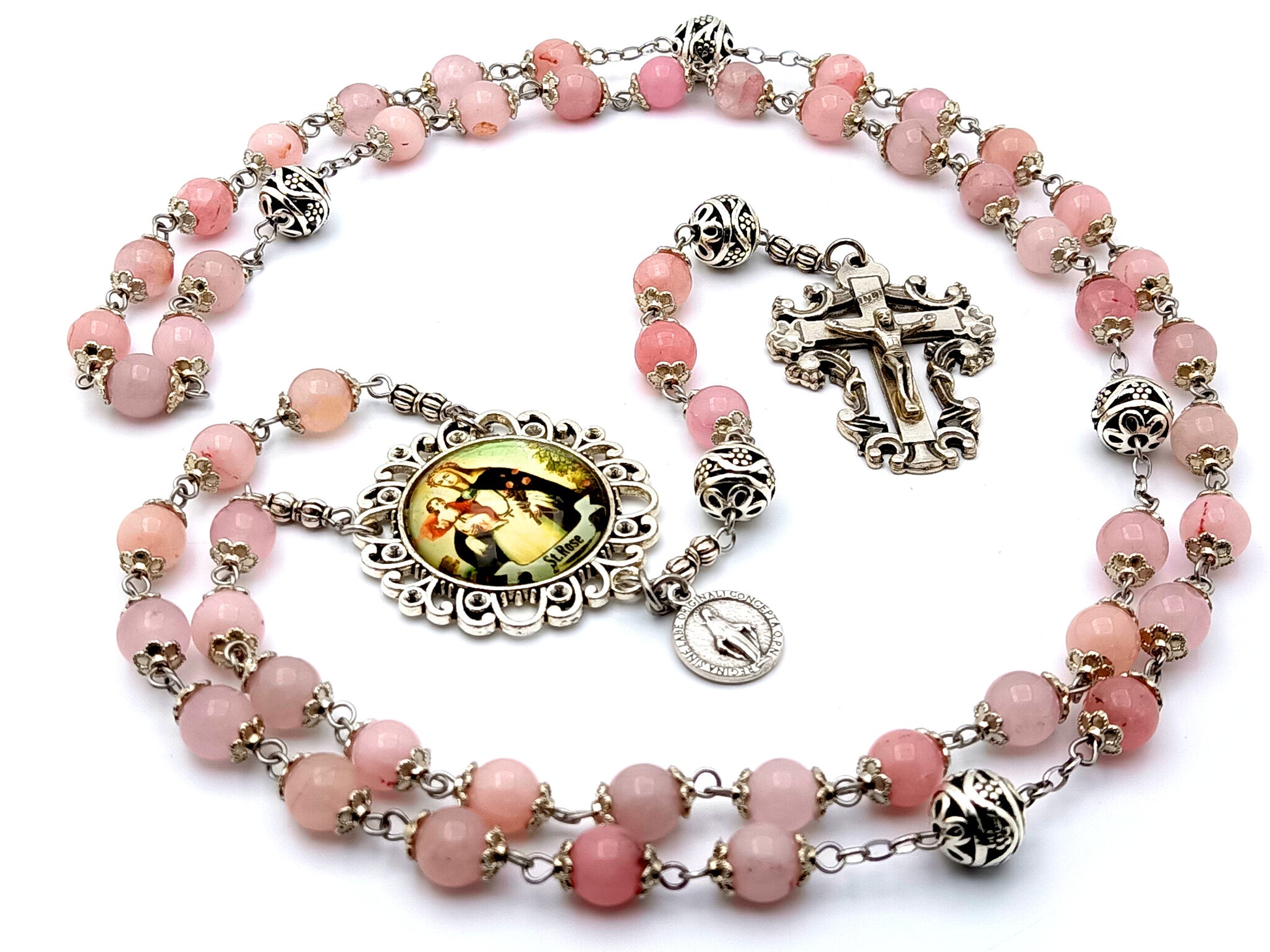 Saint Rose of Lima rose quartz gemstone rosary beads with Miraculous medal and filigree crucifix.