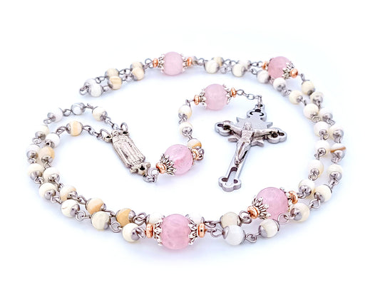 Saint Therese of Lisieux unique rosary beads mother of pearl and rose quartz gemstone rosary beads with Saint Benedict crucifix. 