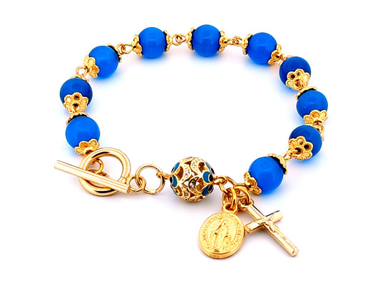 Miraculous medal blue glass and gold unique rosary beads single decade rosary bead bracelet with bar and toggle clasp.