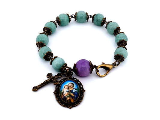 Saint Joseph unique rosary beads antique style aquamarine gemstone single decade rosary bracelet with small brass crucifix.