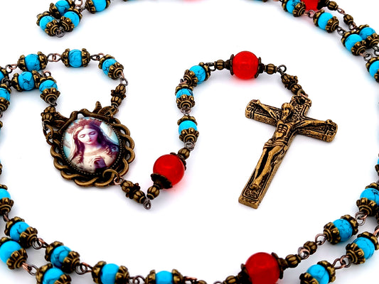 Our Lady Queen of Heaven unique rosary beads turquoise and ruby gemstone rosary beads with brass crucifix.