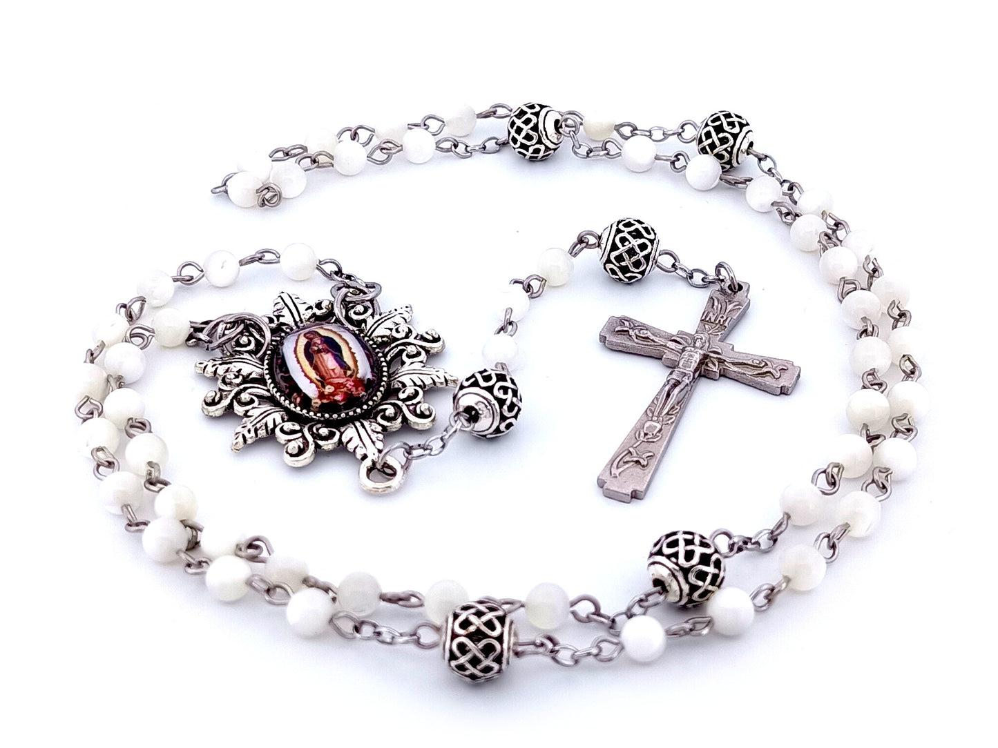 Our Lady of Guadalupe unique rosary beads mother of pearl rosary beads with lattice Our Father beads and Lily crucifix.