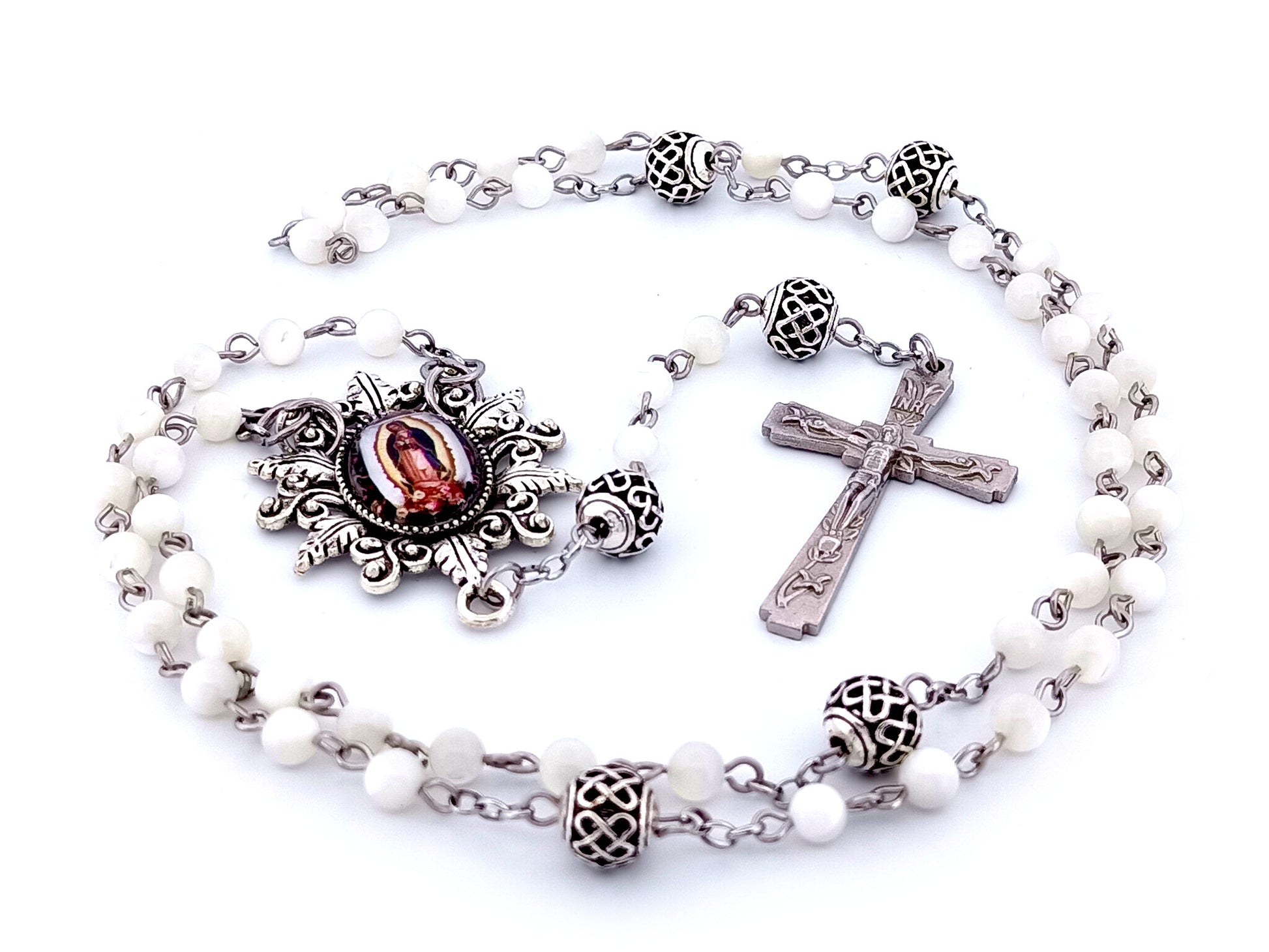 Our Lady of Guadalupe unique rosary beads mother of pearl rosary beads with lattice Our Father beads and Lily crucifix.