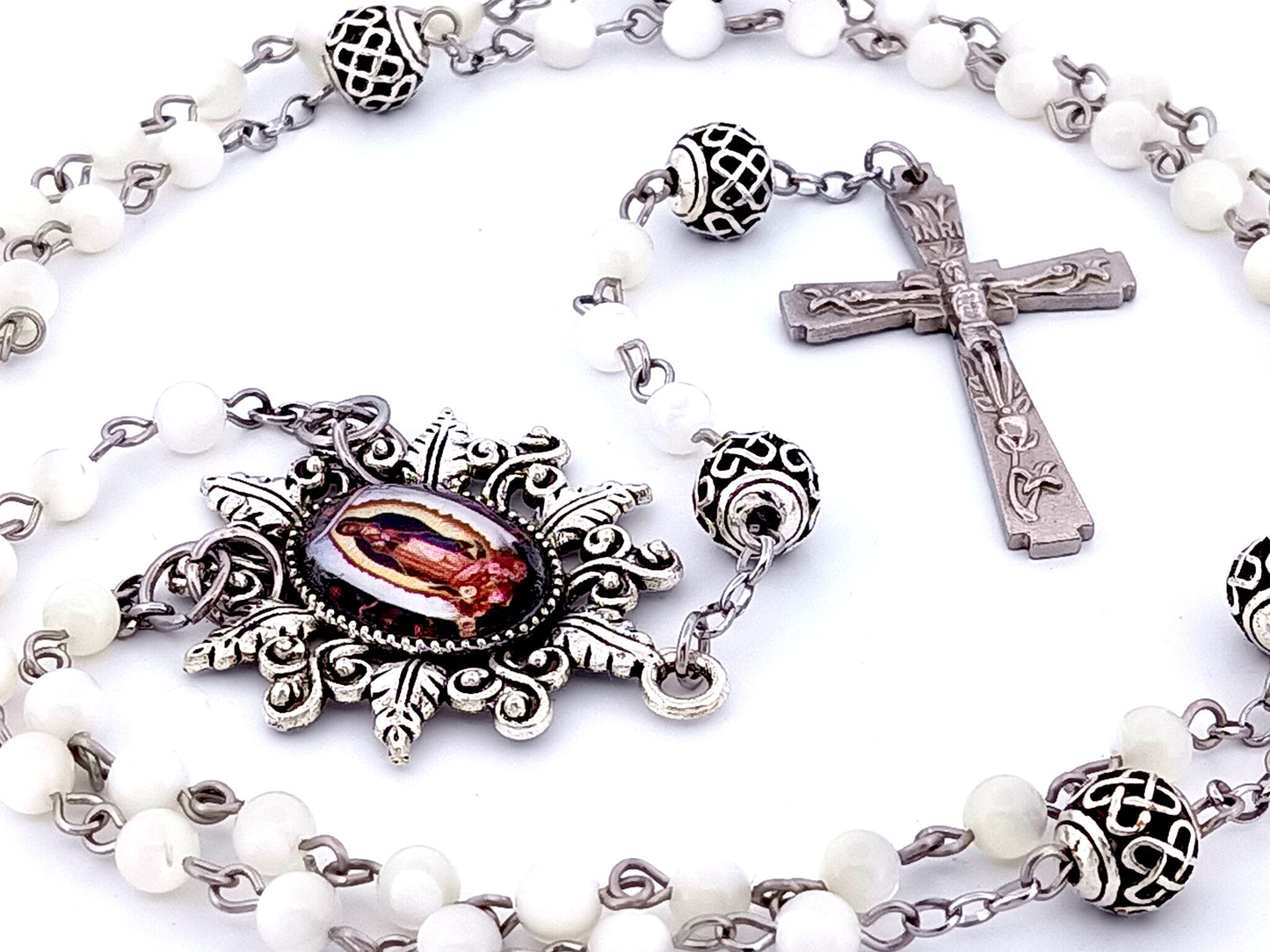 Our Lady of Guadalupe unique rosary beads mother of pearl rosary beads with lattice Our Father beads and Lily crucifix.