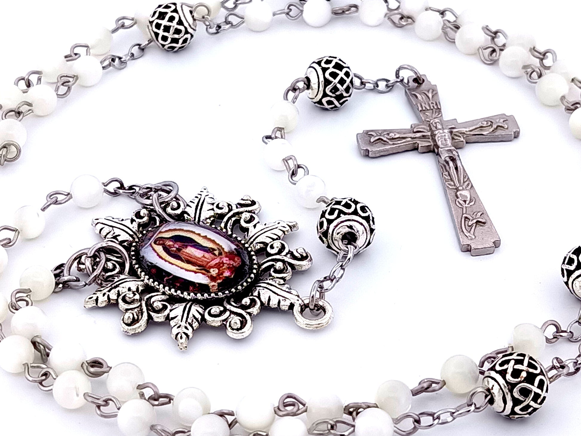 Our Lady of Guadalupe unique rosary beads mother of pearl rosary beads with lattice Our Father beads and Lily crucifix.