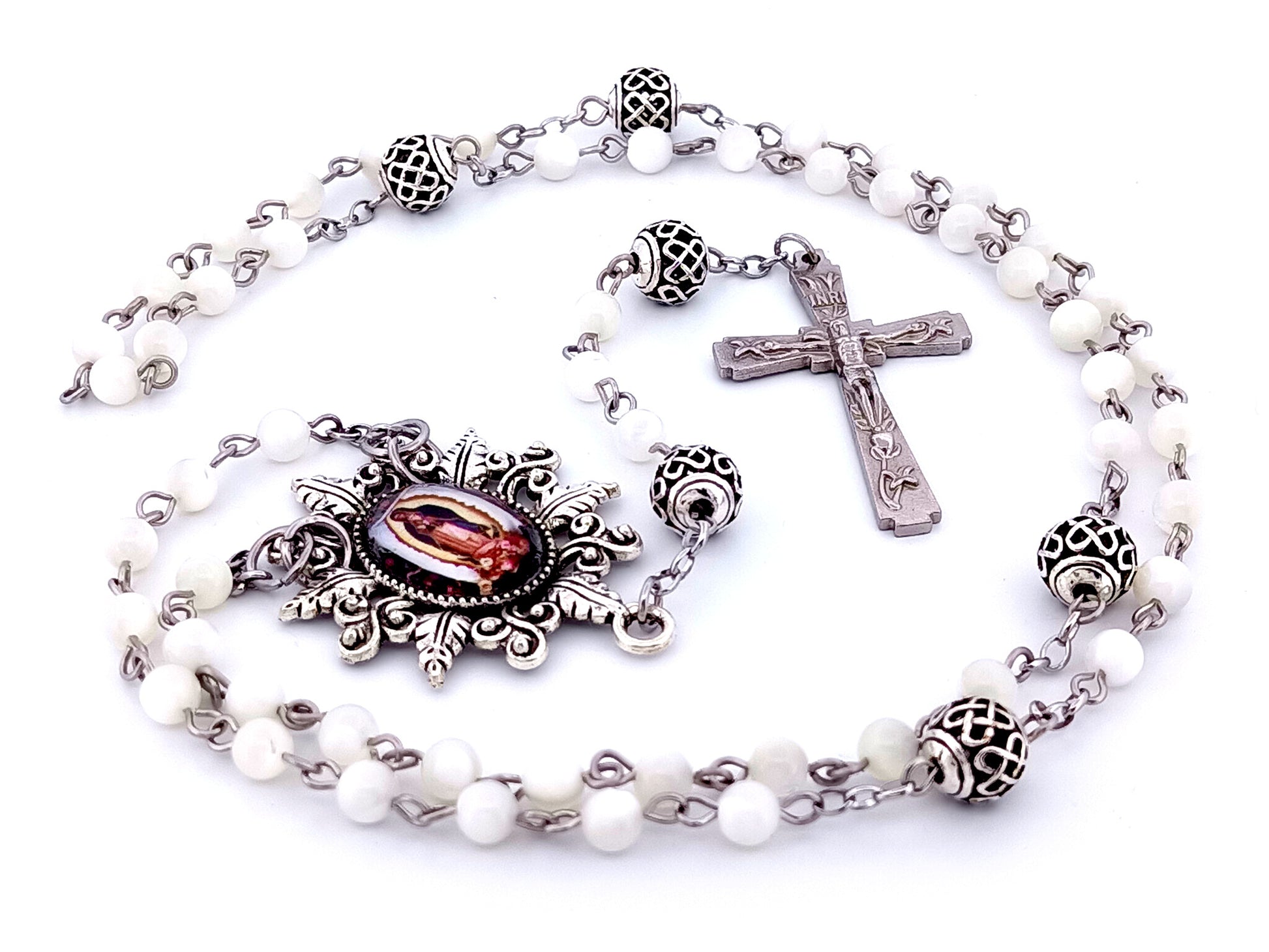 Our Lady of Guadalupe unique rosary beads mother of pearl rosary beads with lattice Our Father beads and Lily crucifix.