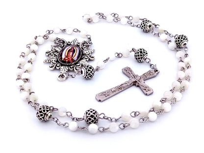 Our Lady of Guadalupe unique rosary beads mother of pearl rosary beads with lattice Our Father beads and Lily crucifix.