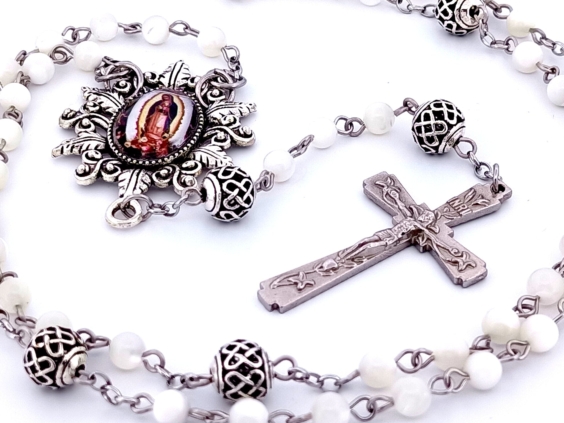 Our Lady of Guadalupe unique rosary beads mother of pearl rosary beads with lattice Our Father beads and Lily crucifix.