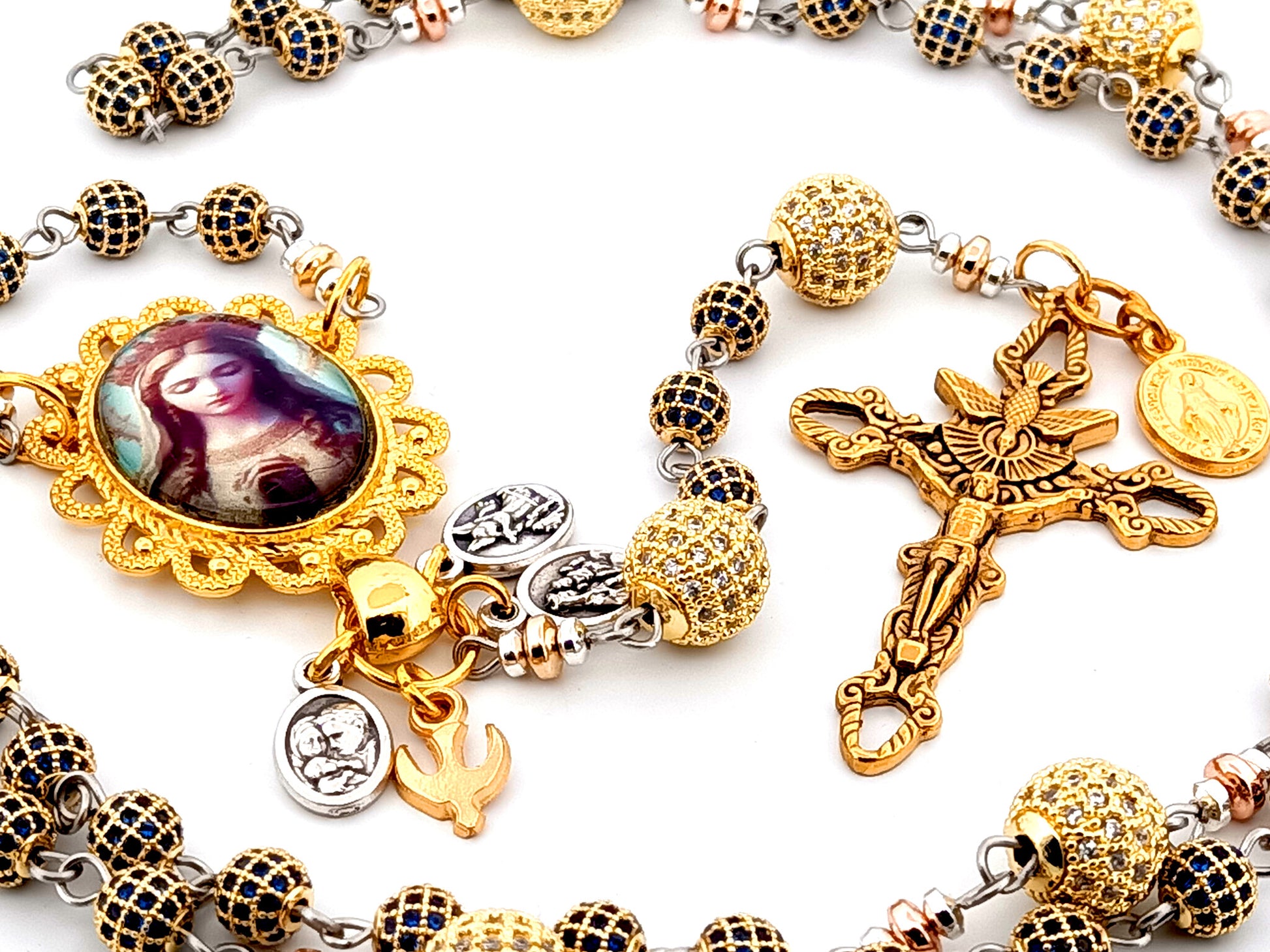 Our Lady Queen of Heaven unique rosary beads sapphire and 18K gold plated rosary with stainless steel gold plated Holy Spirit crucifix.