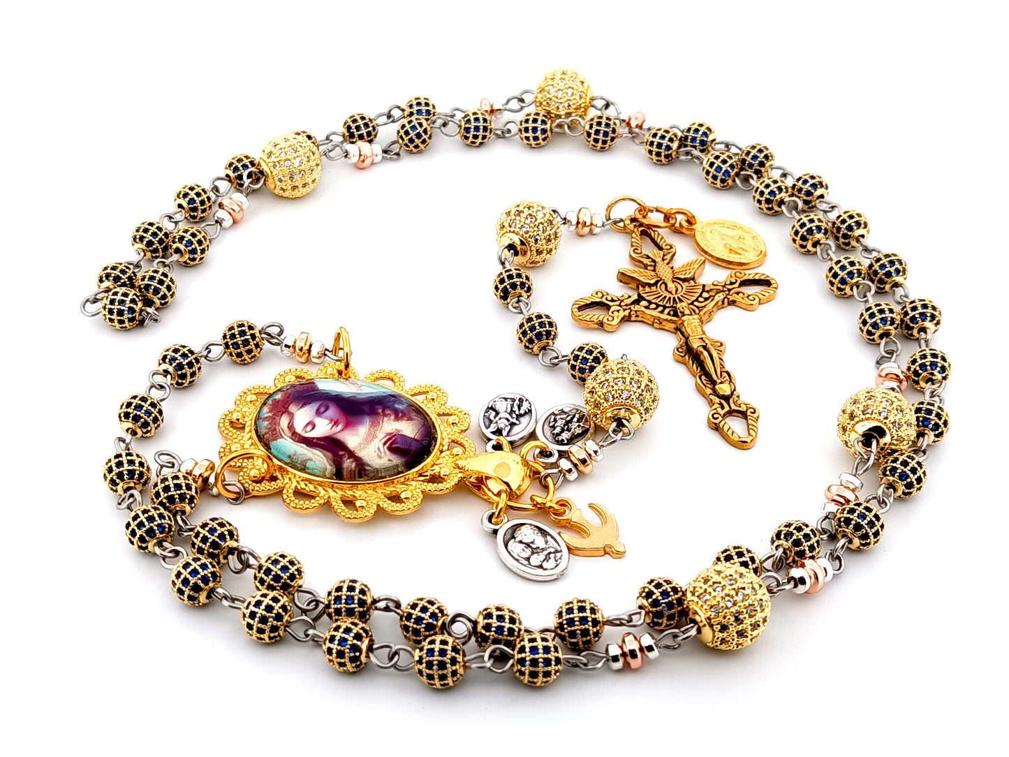 Our Lady Queen of Heaven unique rosary beads sapphire and 18K gold plated rosary with stainless steel gold plated Holy Spirit crucifix.