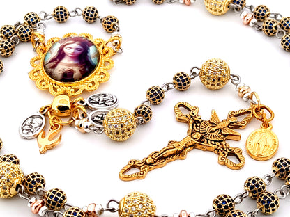Our Lady Queen of Heaven unique rosary beads sapphire and 18K gold plated rosary with stainless steel gold plated Holy Spirit crucifix.