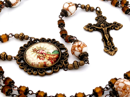 Our Lady of Mount Carmel unique rosary beads  amber glass and howlite gemstone rosary beads with bronze filigree crucifix.