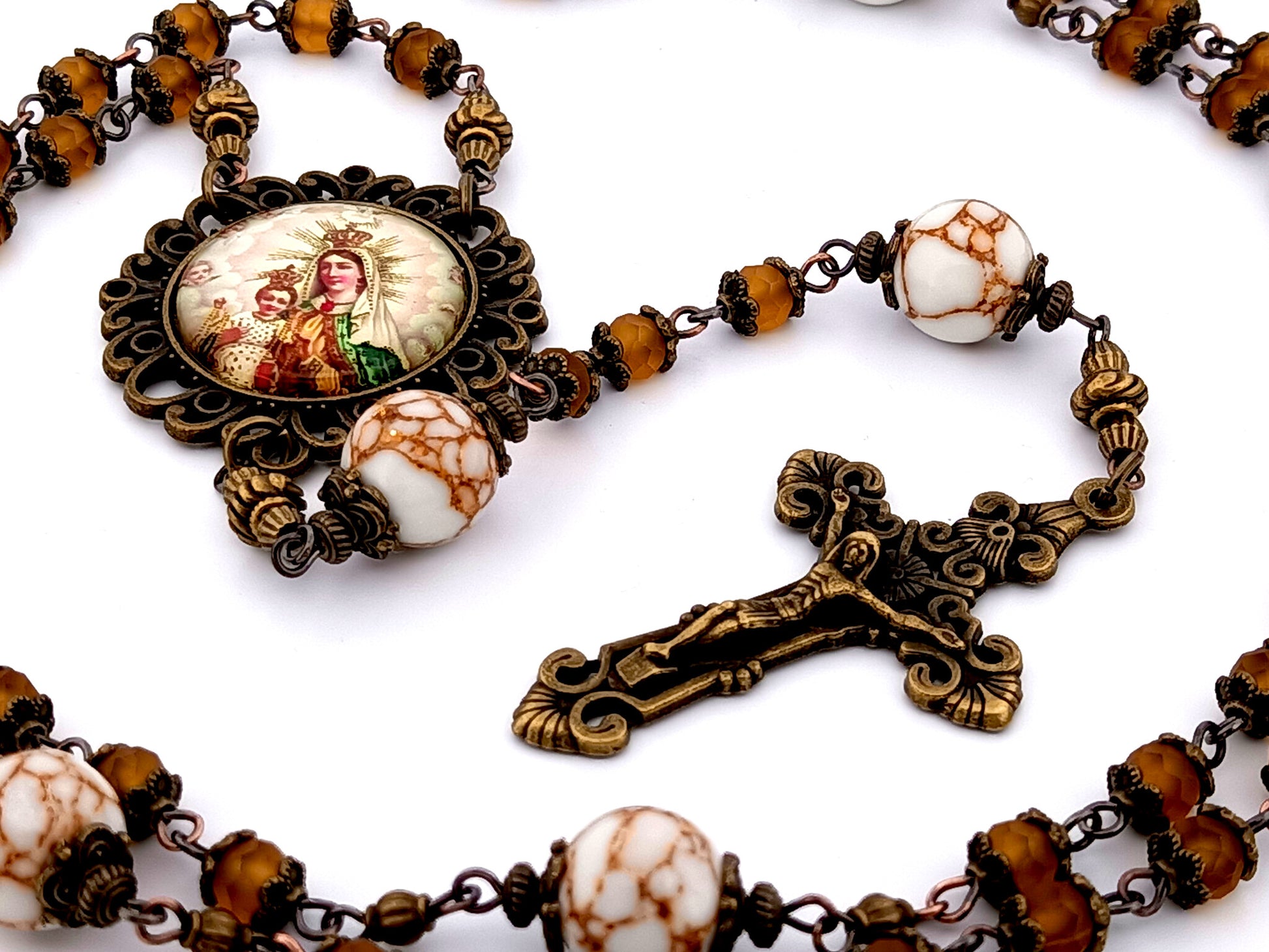 Our Lady of Mount Carmel unique rosary beads  amber glass and howlite gemstone rosary beads with bronze filigree crucifix.