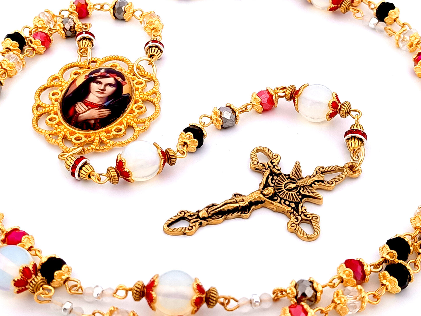 Saint Philomena unique rosary beads glass and gemstone rosary with gold plated stainless steel Holy Spirit crucifix.