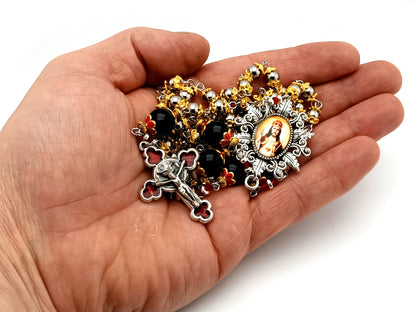 Christ The King unique rosary beads stainless steel and onyx gemstone rosary beads with rose enamel crucifix.