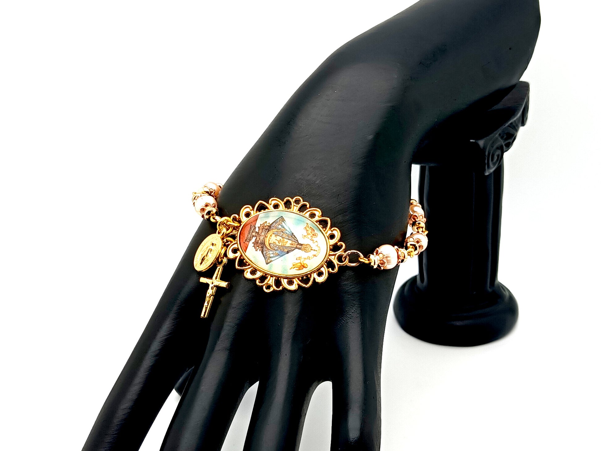 Our Lady of Charity unique rosary beads pink fresh water pearl rosary bracelet with gold Miraculous medal and cross.