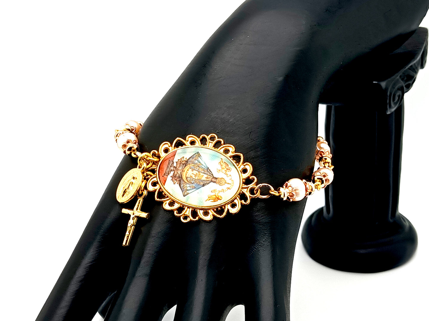 Our Lady of Charity unique rosary beads pink fresh water pearl rosary bracelet with gold Miraculous medal and cross.