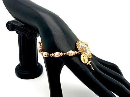 Our Lady of Charity unique rosary beads pink fresh water pearl rosary bracelet with gold Miraculous medal and cross.