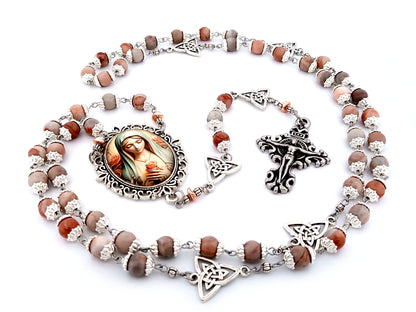 Our Lady with roses unique rosary beads rhodonite gemstone and Holy Trinity medals beads with stainless steel filigree crucifix.