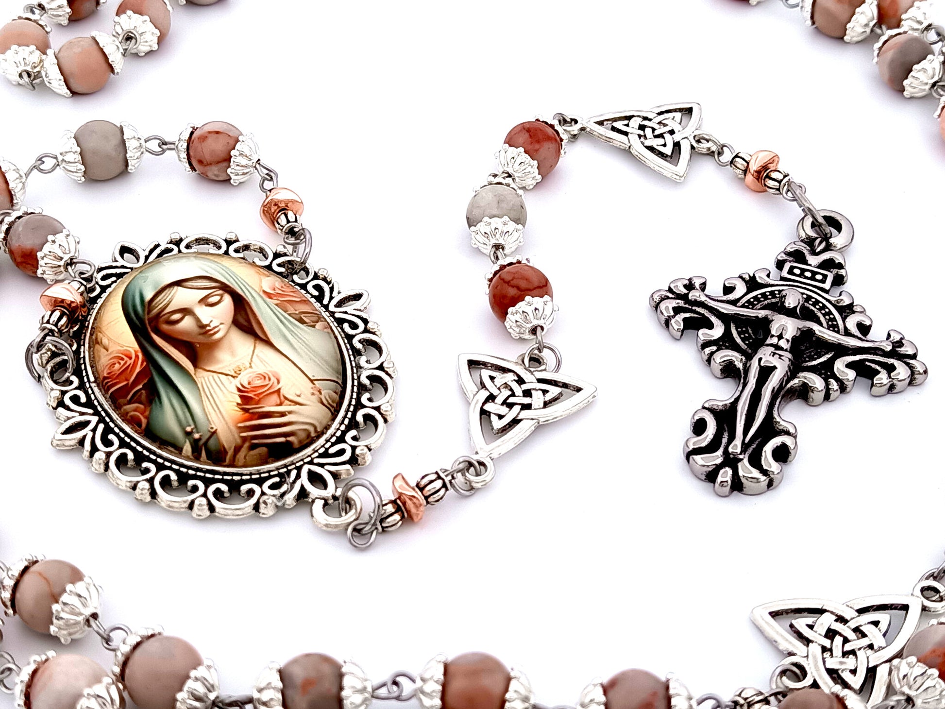 Our Lady with roses unique rosary beads rhodonite gemstone and Holy Trinity medals beads with stainless steel filigree crucifix.