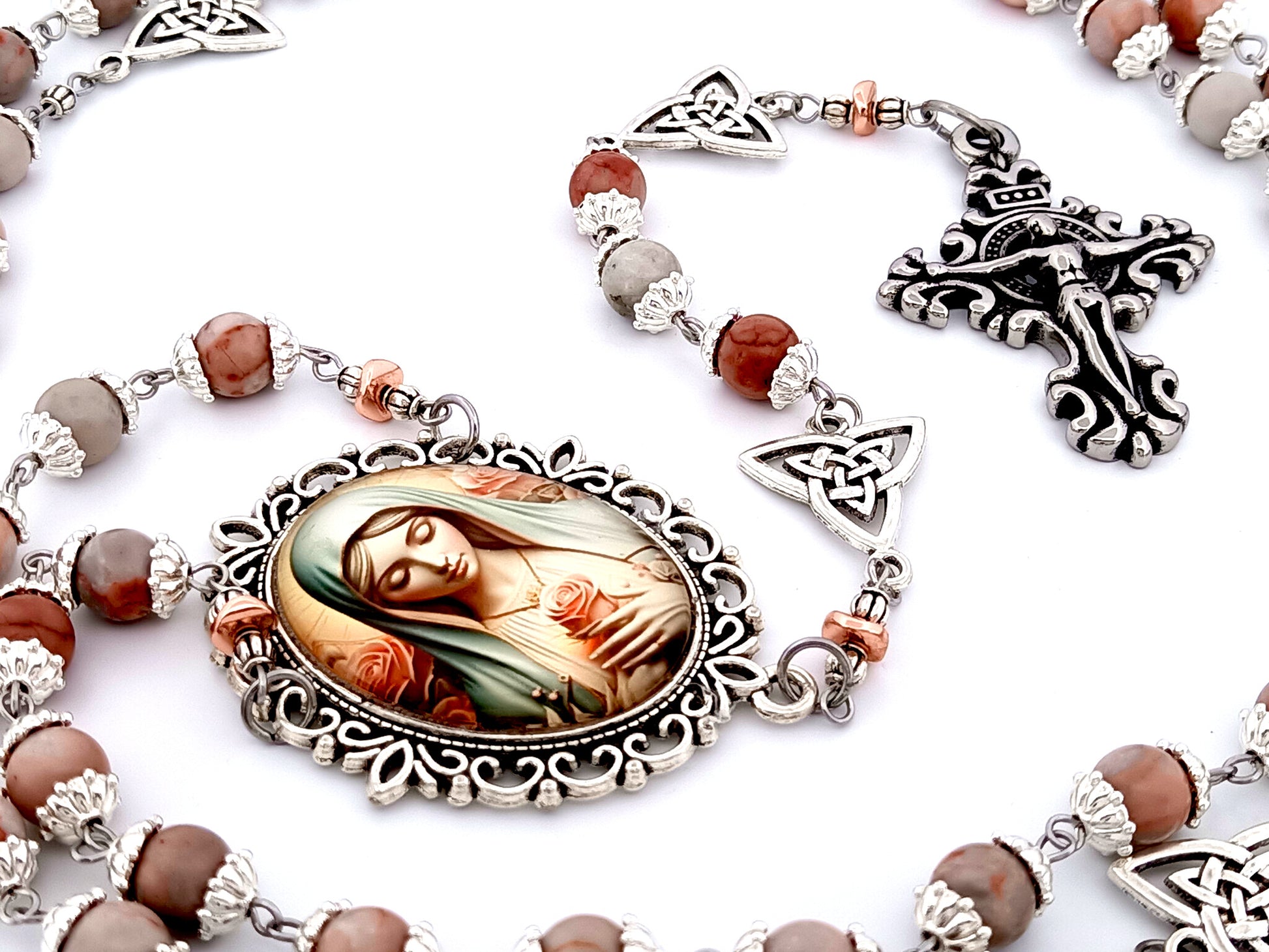 Our Lady with roses unique rosary beads rhodonite gemstone and Holy Trinity medals beads with stainless steel filigree crucifix.