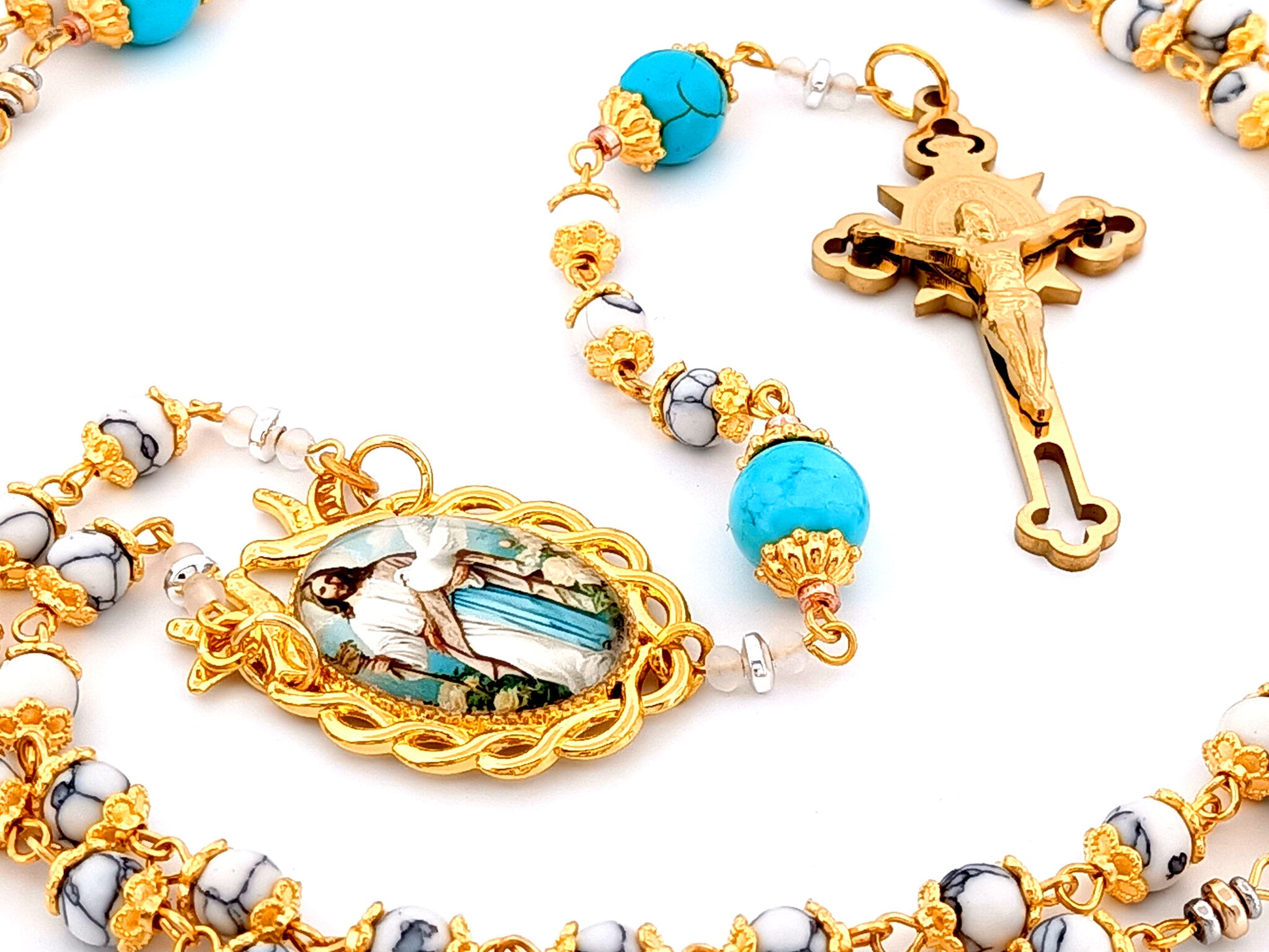 Spirit of Jesus unique rosary beads howlite and turquoise gemstone rosary with gold plated Saint Benedict crucifix.