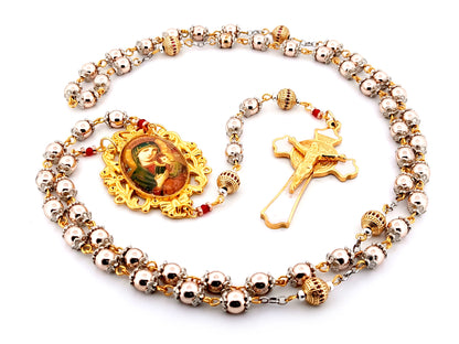 Our Lady of Perpetual Help unique rosary beads rose gold hematite gemstone and 18K gold plated cubic zirconia rosary with white enamel and gold Saint Benedict crucifix.