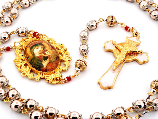 Our Lady of Perpetual Help unique rosary beads rose gold hematite gemstone and 18K gold plated cubic zirconia rosary with white enamel and gold Saint Benedict crucifix.